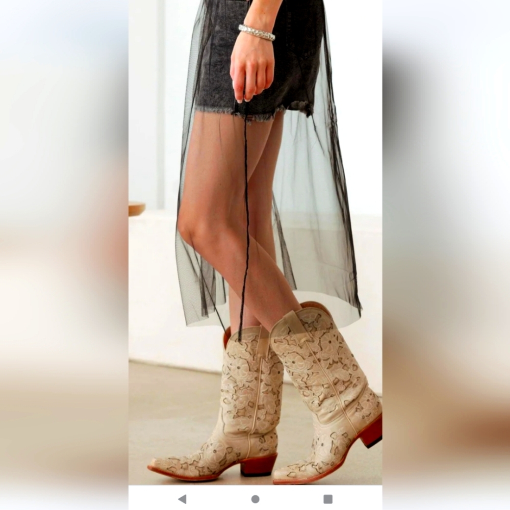 Black denim distressed mini skirt with tulle mesh overlay